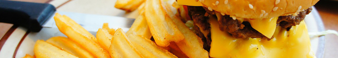 Eating Burger at BuffBurger restaurant in Houston, TX.